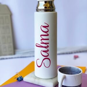 A white insulated bottle with a shiny silver cap and 