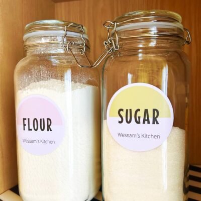 Two glass jars labeled 