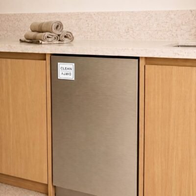 Sleek kitchen with a stainless steel dishwasher labeled 